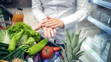 hands-sanitizing-against-corona-virus-while-shopping-supermarket (2) (1)